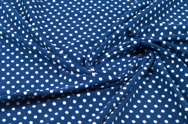 istock Texture. Background. Drawing. Fabric silk blue in white peas 1074780944