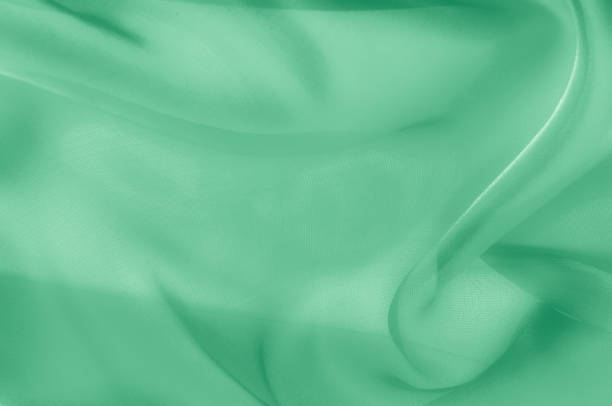 textura, fondo, patrón. tela de seda verde pálida. es muy suave y fino tul, tul de seda suave. parece una cortina, mucho más suave que una ilusión de la boda - 24187 fotografías e imágenes de stock