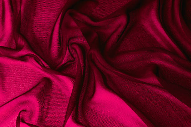 istock Texture, background, pattern. Red transparent fabric. Organza Silk Fabric Hand Dyed Madder Pale orange rust Red tangerine transparent natural plant 1074784802