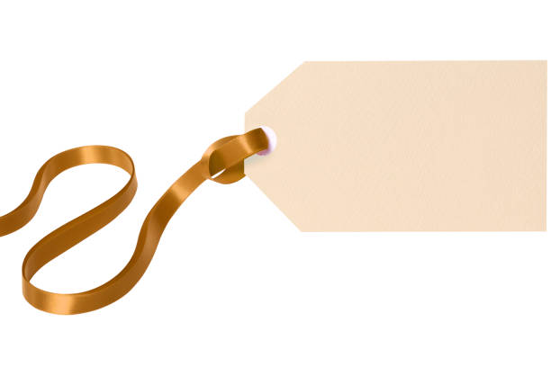 istock Gift tag gold ribbon isolated white background 1074787222