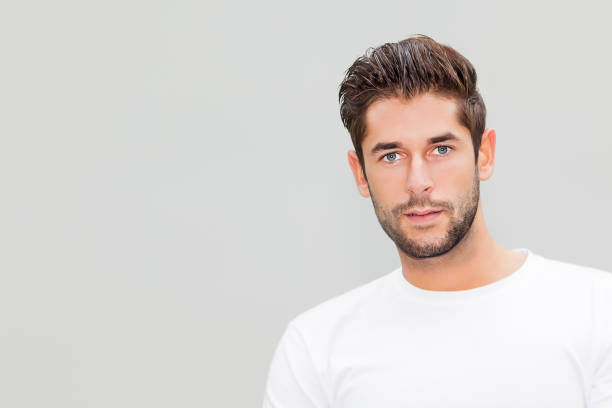 istock young male portrait 1074799420