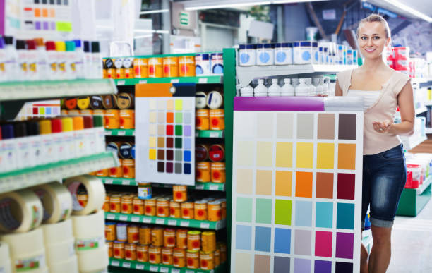 istock Woman choosing color for painting using palette scheme 1074805634