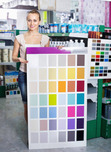istock Woman choosing color for painting using palette scheme 1074805652