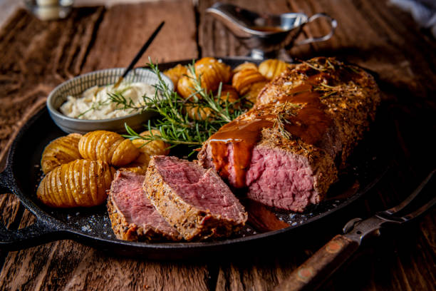 istock Whole beef fillet and potatoes 1074805858