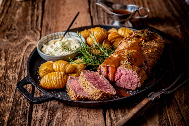 istock Whole beef fillet and potatoes 1074805994