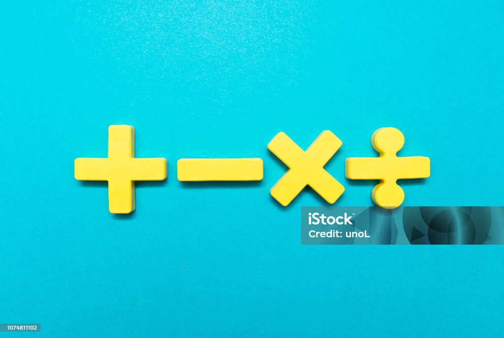 Symbols of Four fundamental arithmetic operations, addition, subtraction, multiplication, division Symbols of Four fundamental operations, addition, subtraction, multiplication, division on the sky blue board Mathematics Stock Photo
