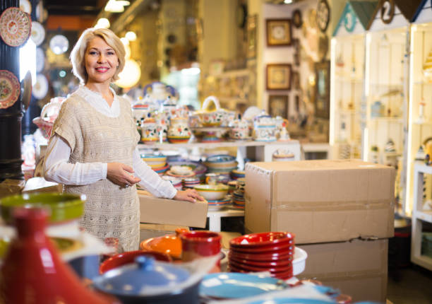 istock woman buying ceramic ware 1074811310