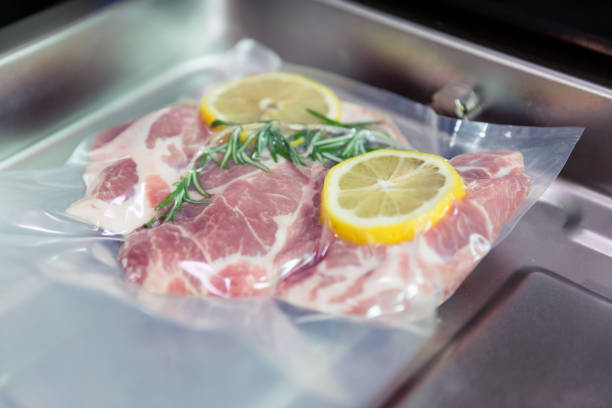 istock Sous vide steak with rosemary and lemons. 1074811766
