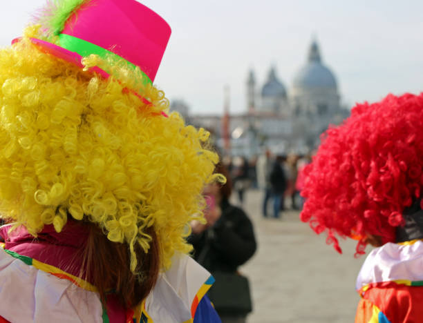 istock clowns with wig during the Venetian carnival 1074816284