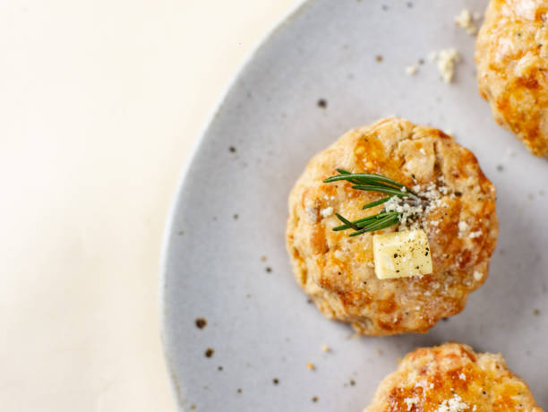 homemade cheese scones with butter. - muffin cheese bakery breakfast imagens e fotografias de stock