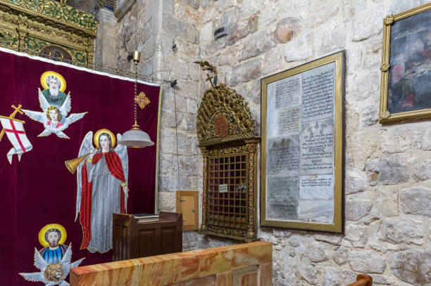 Fragment of the interior in St. Mark's Church - The Syrian Orthodox Church in old city of Jerusalem, Israel Jerusalem, Israel, November 24, 2018 : Fragment of the interior in St. Mark's Church - The Syrian Orthodox Church in old city of Jerusalem, Israel st markos church pic stock pictures, royalty-free photos & images