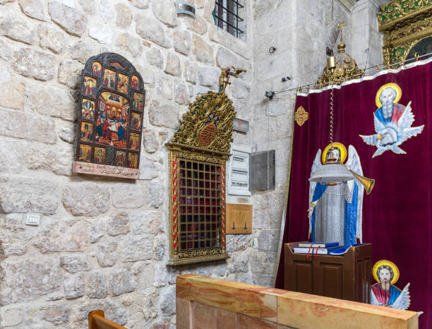 Fragment of the interior in St. Mark's Church - The Syrian Orthodox Church in old city of Jerusalem, Israel Jerusalem, Israel, November 24, 2018 : Fragment of the interior in St. Mark's Church - The Syrian Orthodox Church in old city of Jerusalem, Israel st markos church pic stock pictures, royalty-free photos & images