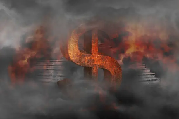 Photo of Rust dollar sign burned in a flaming fire with stairs from underground upward