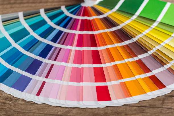 istock Colour swatch on wooden table as background 1074830232