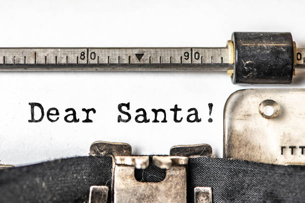 istock Dear Santa typed words on a vintage typewriter. Close up 1074846562
