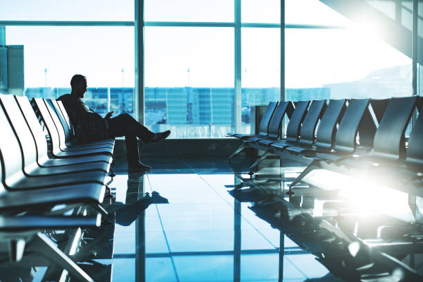 istock Man sitting at Airport 1074849460