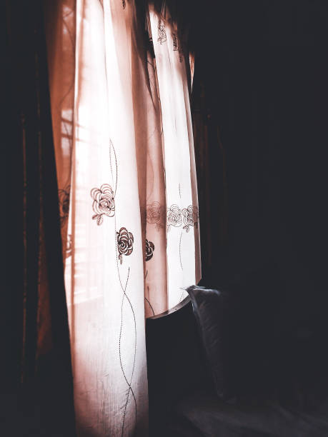 istock Dark room were  light looking through the window. 1074852320