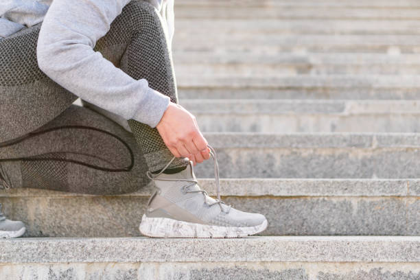 istock Tying sports shoe. 1074852654