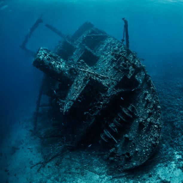 istock Huge rusty shipwreck completely overgrown by corals and algae lying at the bottom of the Red Sea 1074854184