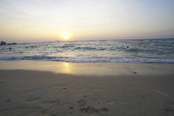 beautiful sea and the beach with sunset time