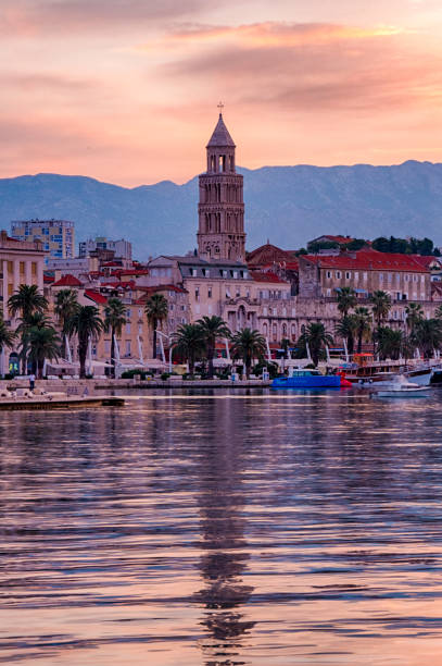 istock Split Harbor landscape at a beautiful orange sunrise 1074857286