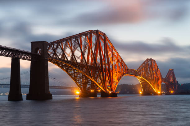 istock Evening view Forth Bridge over Firth of Forth in Scotland 1074857572