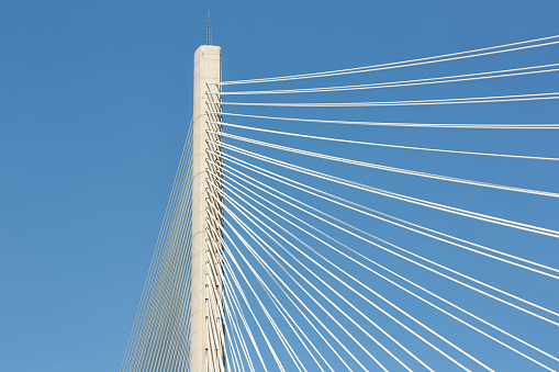 Pillar and ropes new Queensferry Crossing road bridge over Firth of Forth near Queensferry in Scotland