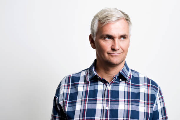 istock Confident mature businessman looking away 1074865136