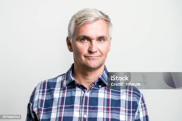 Portrait Of Confident Mature Businessman Stock Photo - Download Image Now - Men, Portrait, White Background