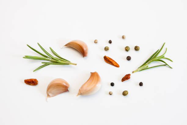 istock Raw garlic segments and spices. 1074866778