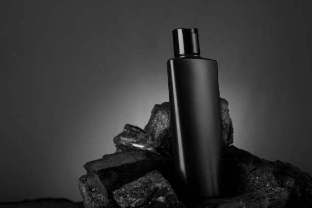 istock Black Blank Product Bottle on Black Stone for Mockups 1074866866