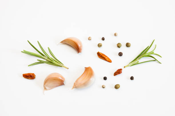 istock Raw garlic segments and spices. 1074866960