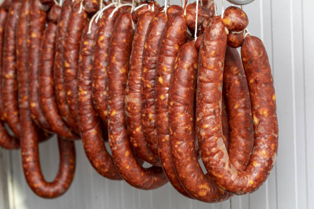 istock Chorizos cured and hung in strings (sausages) 1074868386