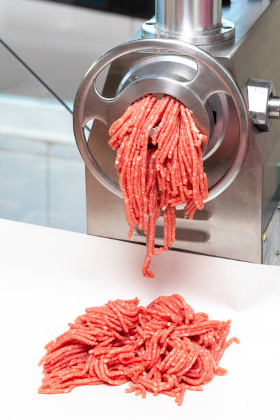 istock Process of chopped beef and pork (for hamburgers, meatballs, ...). Mince. 1074868524