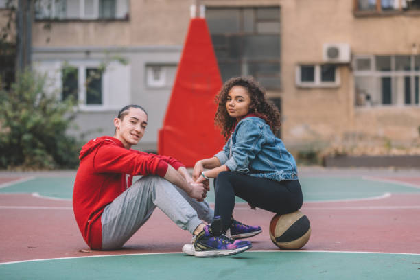istock Couple relaxing after basketball 1074877436