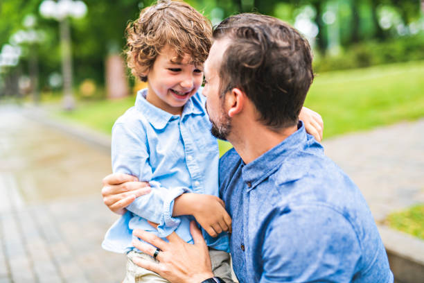 istock Happy father and son portrait playing together having fun 1074887042
