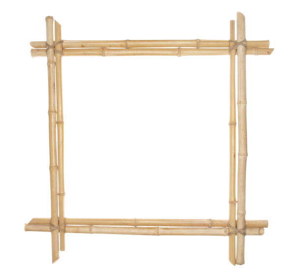 istock Bamboo frame tied up with rope isolated on white background. 1074887444