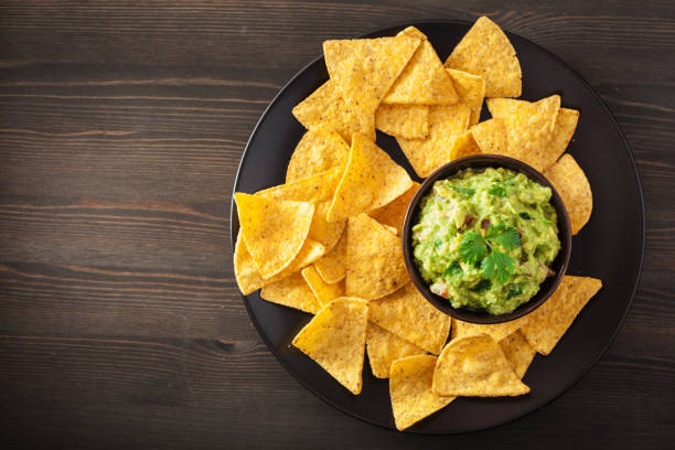 istock mexican guacamole dip and nachos tortilla chips 1074895374