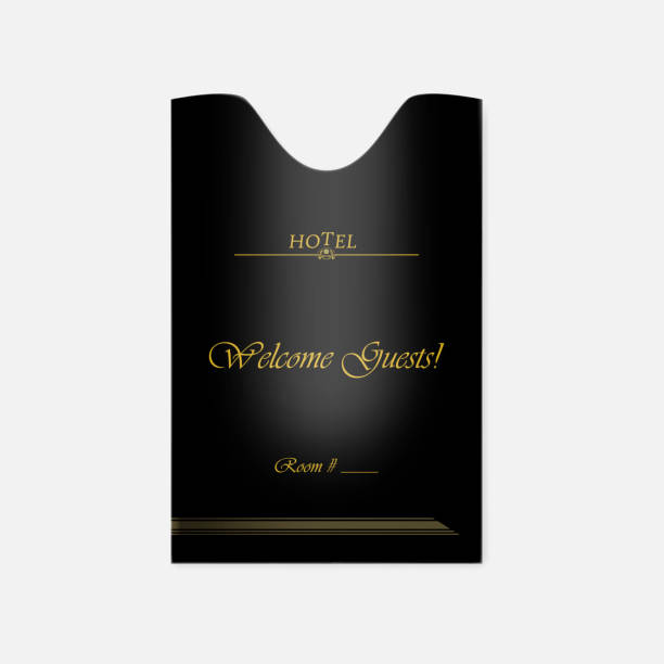 uchwyt na klucze hotelowe - pionowa czarna koperta ze złotym tekstem próbki - hotel key key hotel isolated stock illustrations