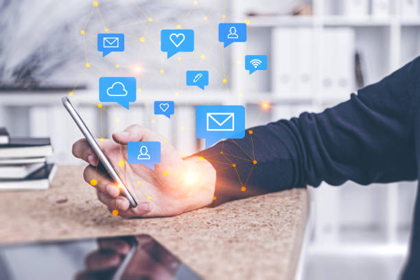 istock Woman hand with smartphone, cloud icons 1074902894