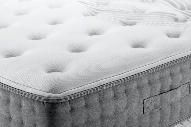 istock Closeup bed Mattress 1074903060
