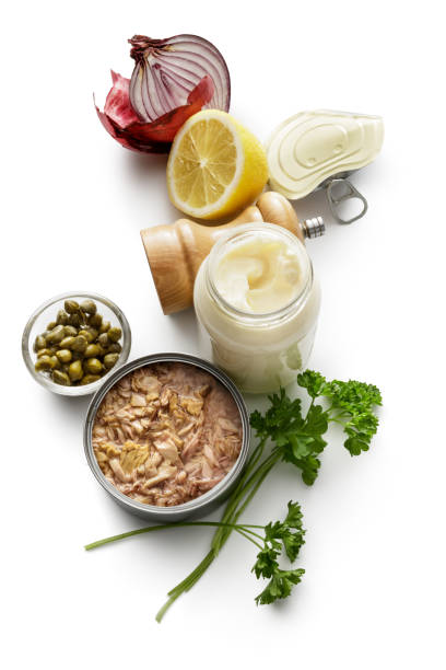 istock Seafood: Ingredients for Tuna Salad Isolated on White Background 1074906214