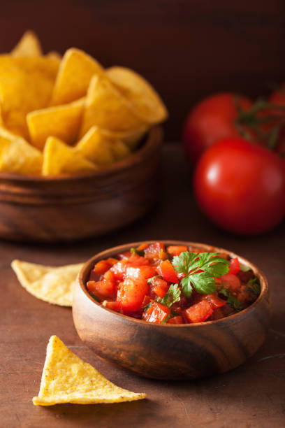 istock mexican salsa dip and nachos tortilla chips 1074907152