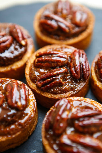 istock Cocoa cupcakes with natural nuts and biscuit 1074909760