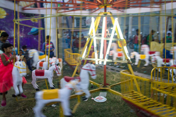 Chandannagar, West Bengal, India - November 18, 2018: Indian Carousel in a Local fair during the Jagadhatri Puja celebration.