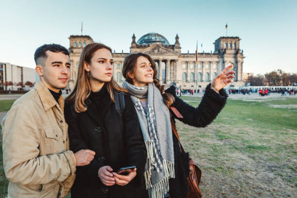 istock Three friends at The Reichstag in Berlin 1074919028