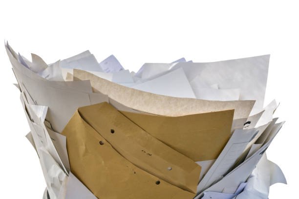 istock Paper waste in front of white background 1074924810