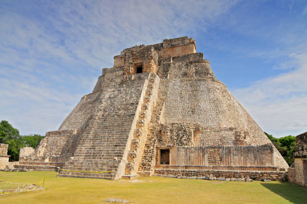 The Pyramid of the Magician (Pyramid of the foreteller) a Mesoamerican step pyramid located in the ancient, Pre Columbian city of Uxmal, Mexico. The Pyramid of the Magician (Pyramid of the foreteller) a Mesoamerican step pyramid located in the ancient, Pre Columbian city of Uxmal, Mexico. uxmal stock pictures, royalty-free photos & images