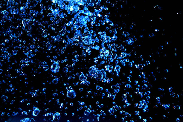 istock drops of water in blue color 1074927554