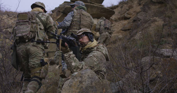 istock Soldier providing cover during patrol 1074937176